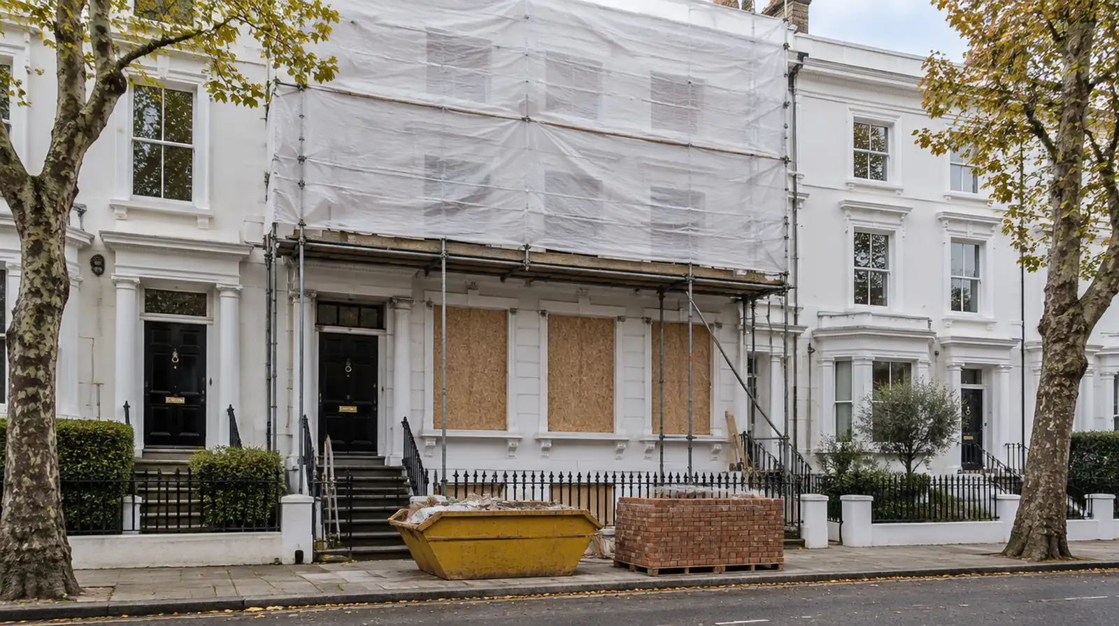 House renovation cost London: Victorian townhouse under refurbishment with scaffolding in Notting Hill